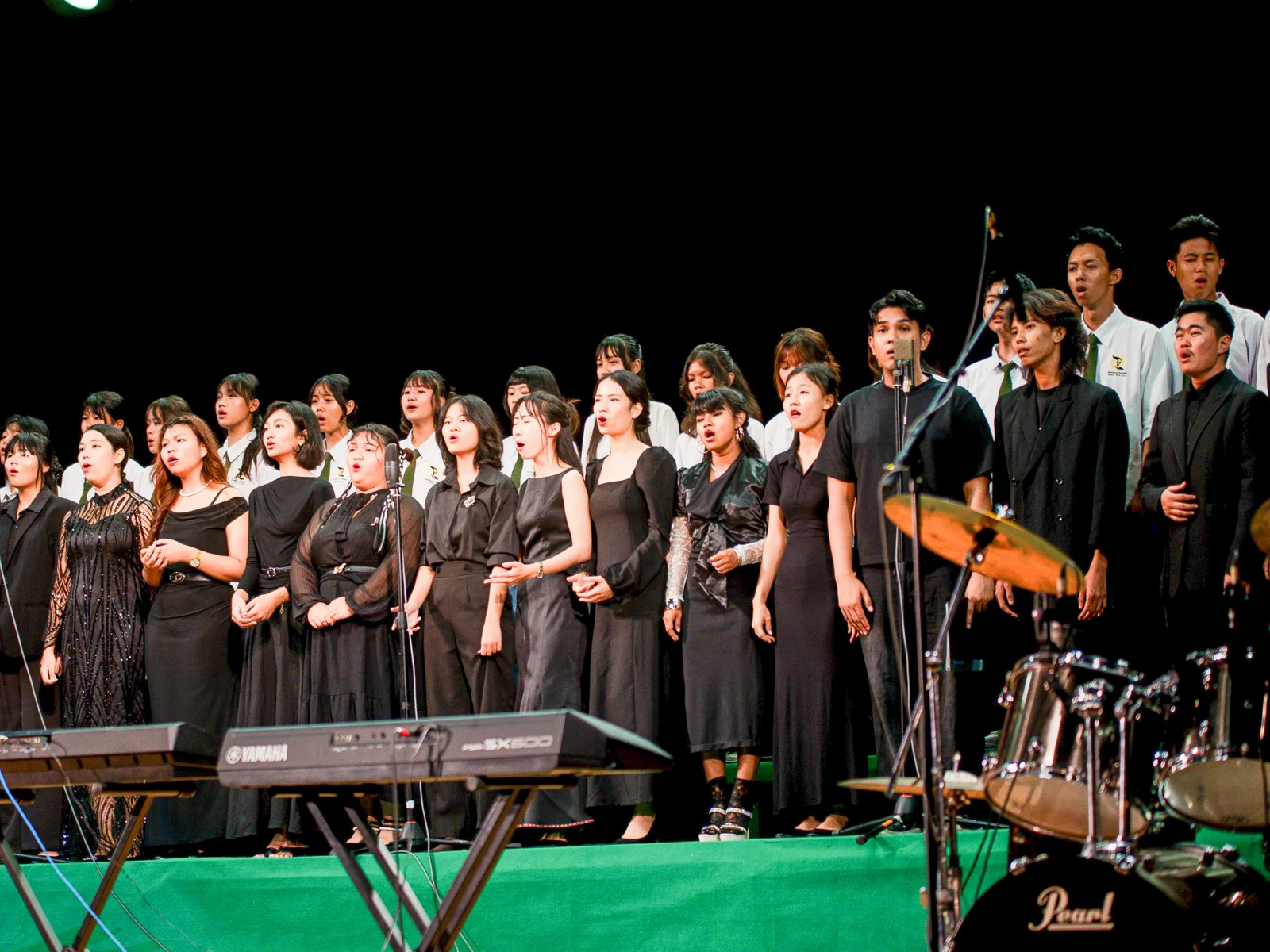 Myanmar Music Festival choir members singing together on stage