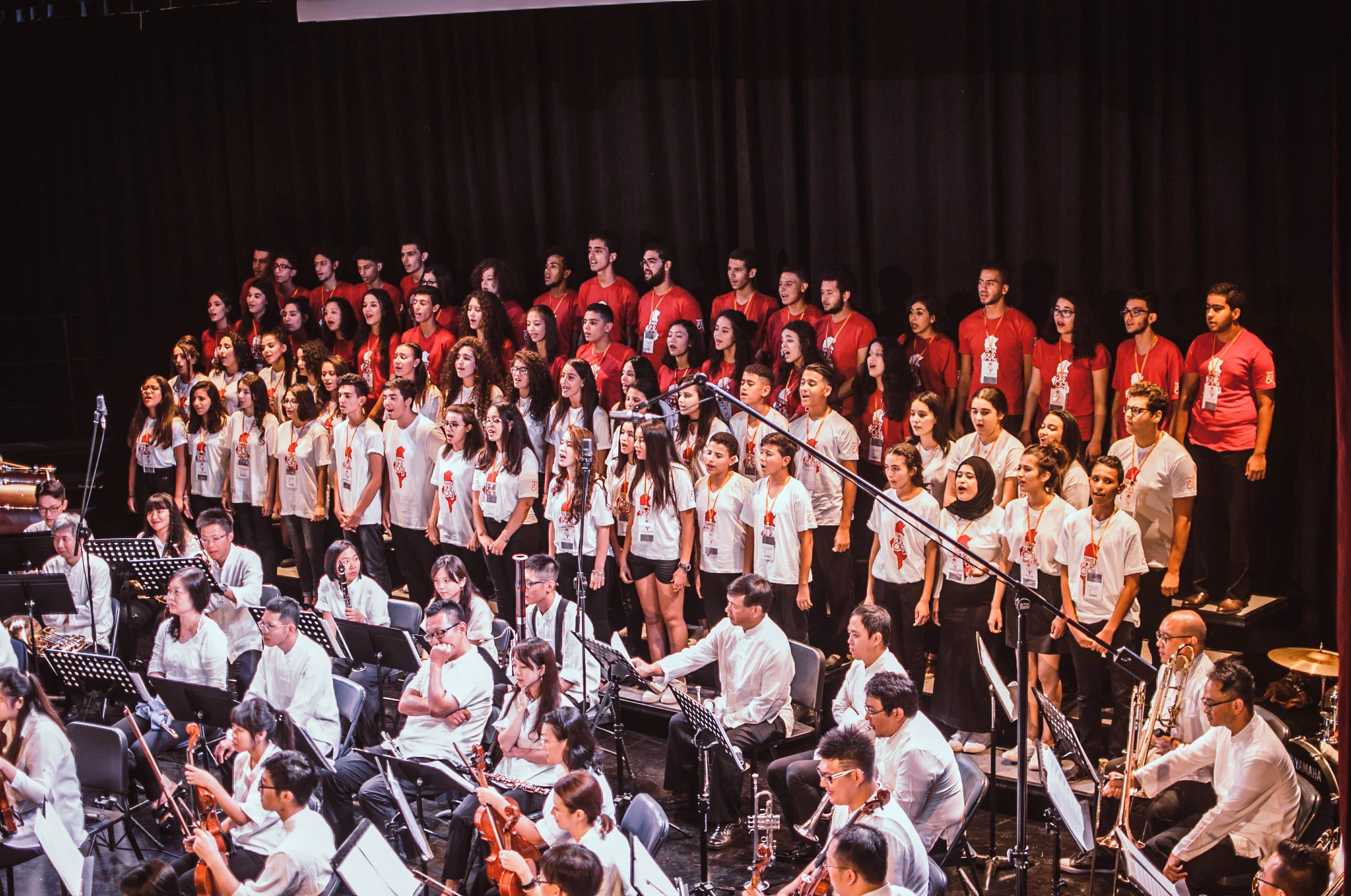 Students from Taiwan and Tunisia performing together on stage